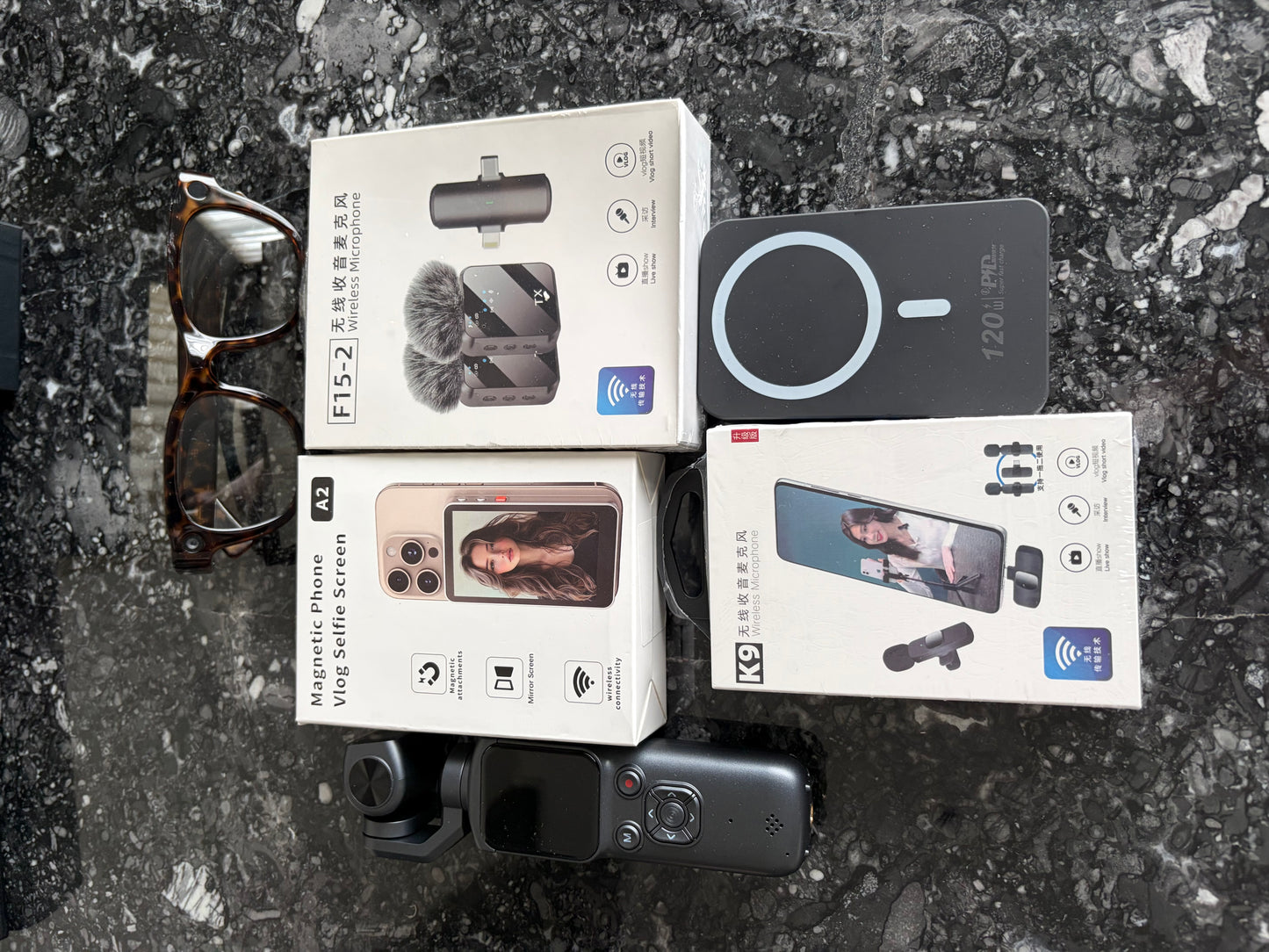 Vlogging bundle 🚨Please Read🚨 1 pair of AI glasses comparable to ray bans
1 pocket camera pink, white or black 1 32gig memory card
1 power bank
Both wireless mics shown
1 phone vlog magnetic selfie screen